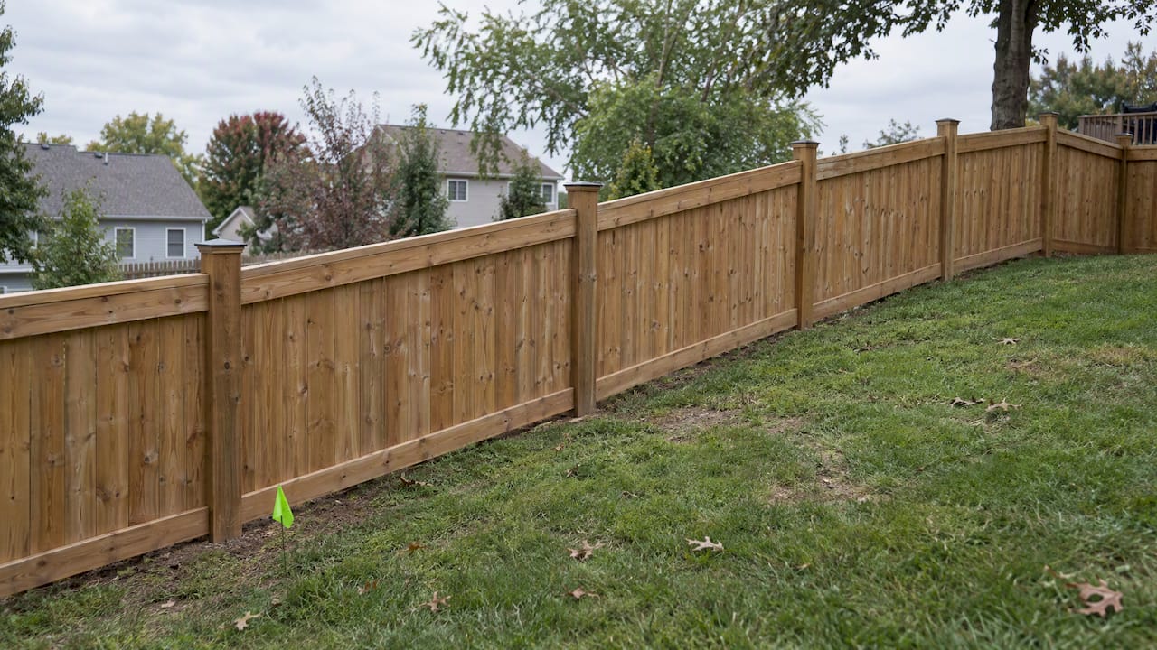 Fence on a Slope: Homeowners Match Panels to 12–15° Grades